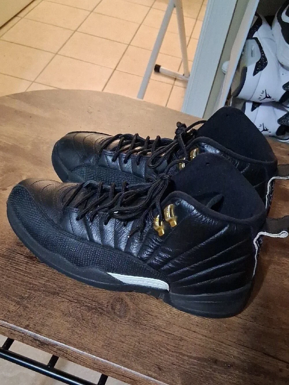 Jordan Men's High-Top Sneakers in Black with Gold Accents